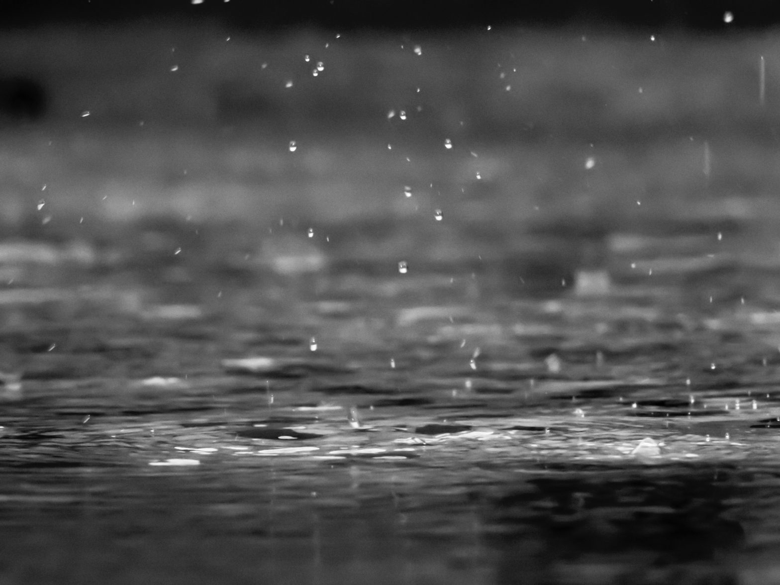 Rain falling on waters.